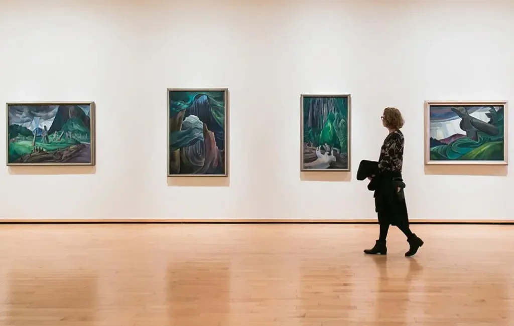 Woman walking on an art gallery