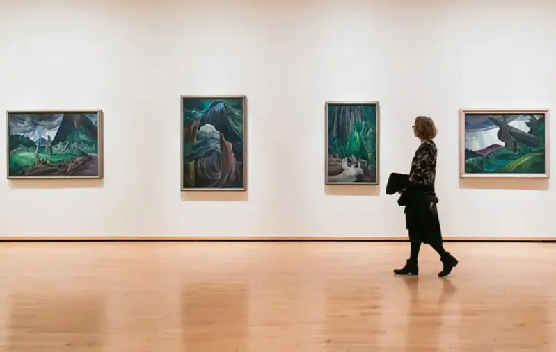 A woman walking in a museum