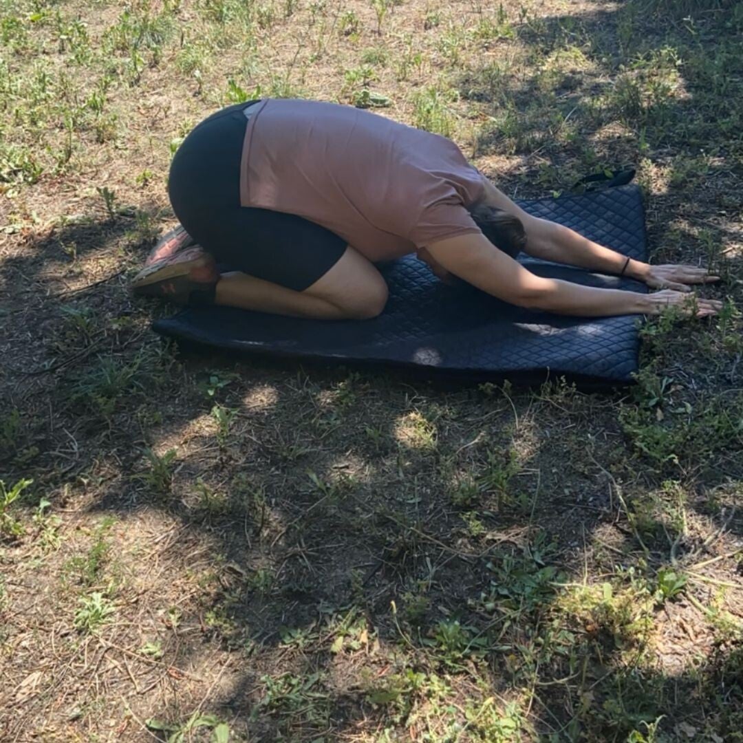 Postura para descanso en talones con extension adelante