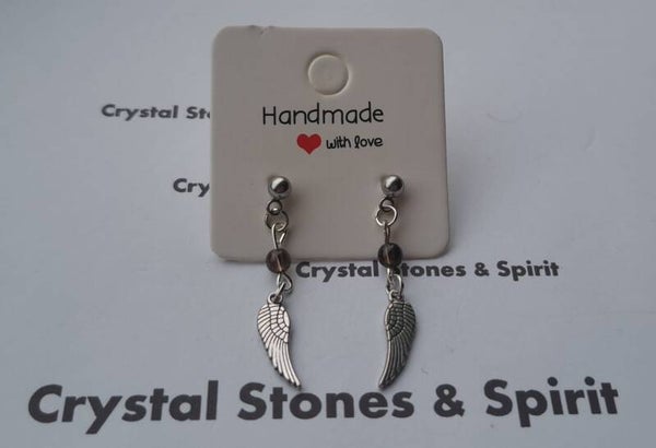 Oorbellen "Rookkwarts" met vleugel Zilverkleurig knop