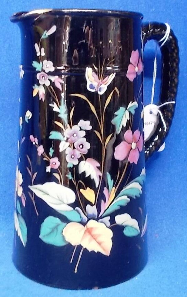 15471 Donkere kan met kleurrijke bloem decoratie. VERKOCHT