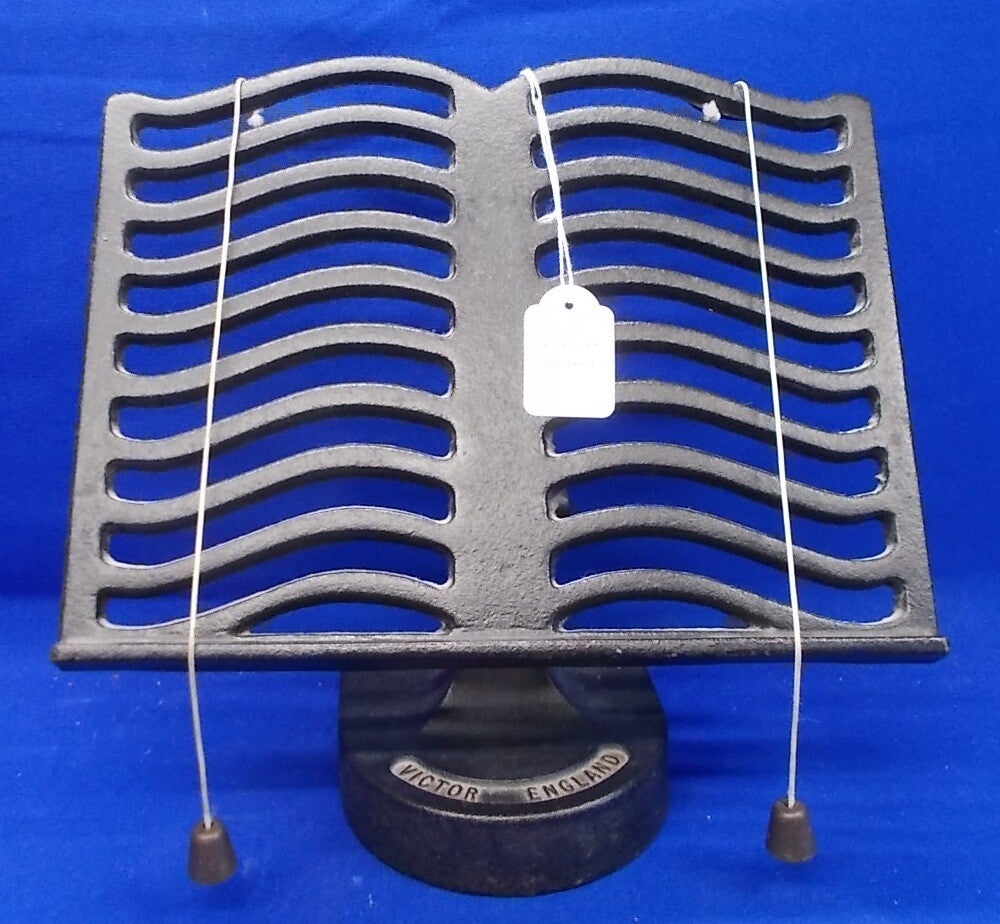 32967. Gietijzeren boekenstandaard