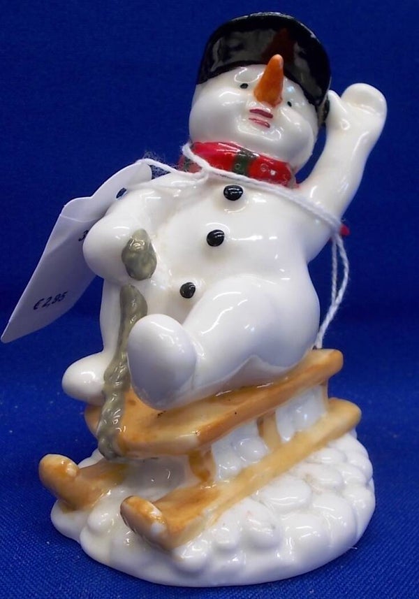 34994. Sneeuwpop op slee