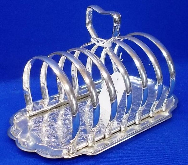 52463. Verzilverd toastrack.