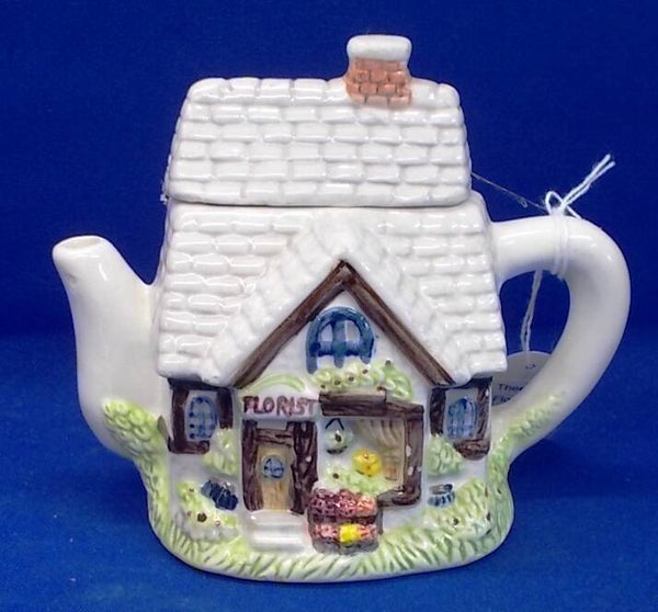 92616. Theepot van bloemist