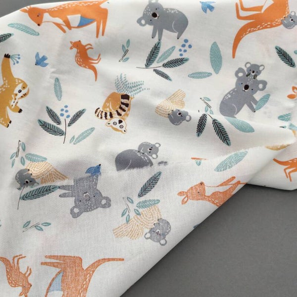 Tissu coton  imprimé animaux vendu par 50cm