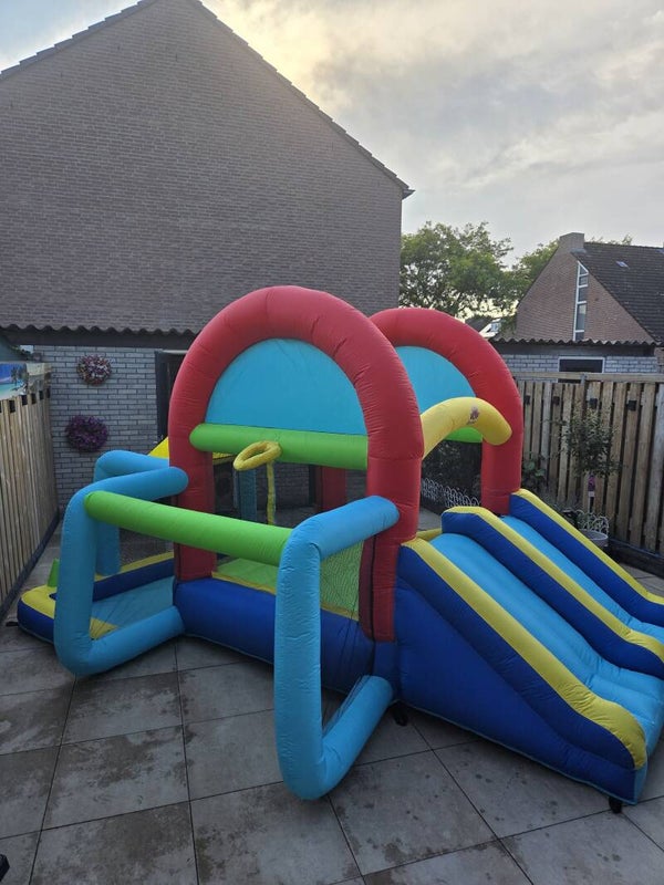 Springkussen met dubbele glijbaan