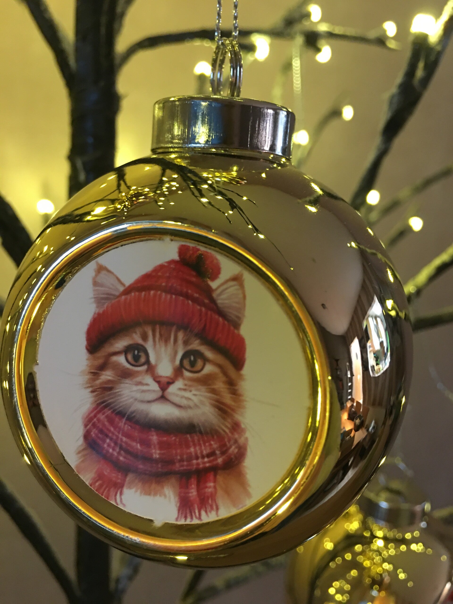 Gouden kerstbal katje