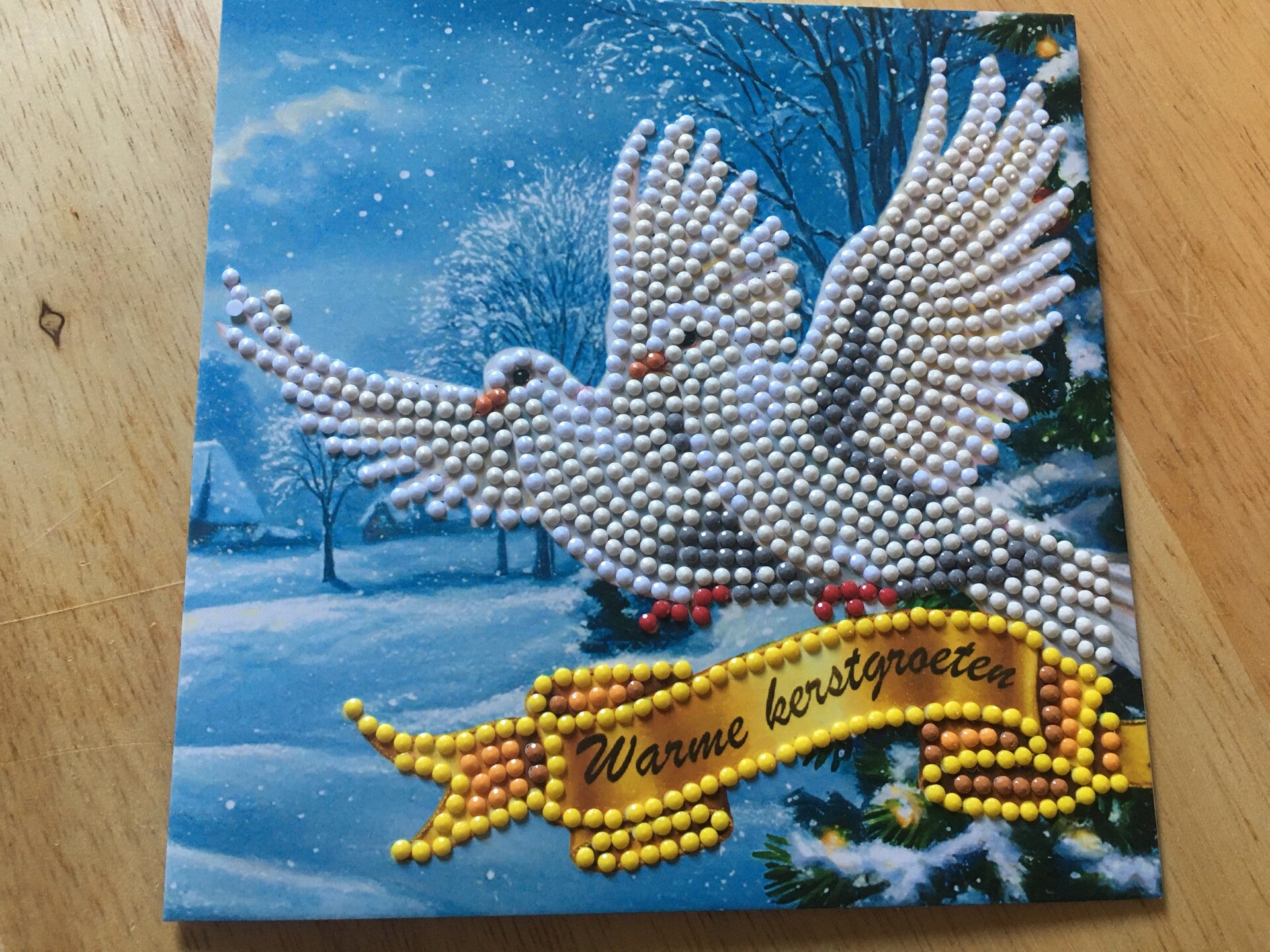 Witte duiven met kerstgroeten