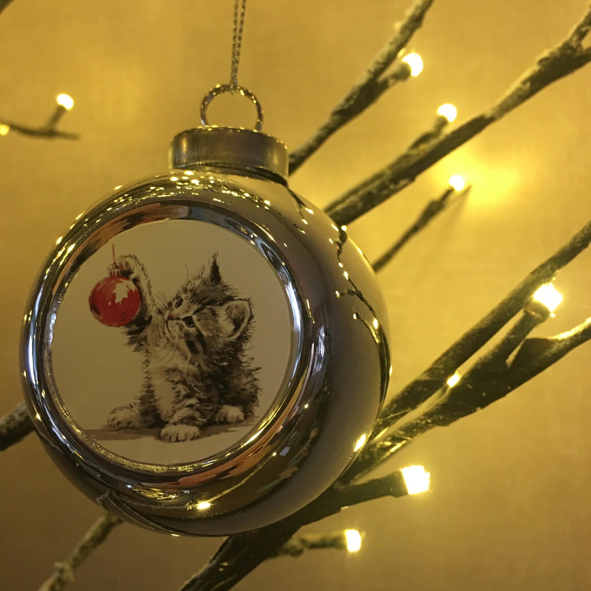 Zilveren kerstbal katje