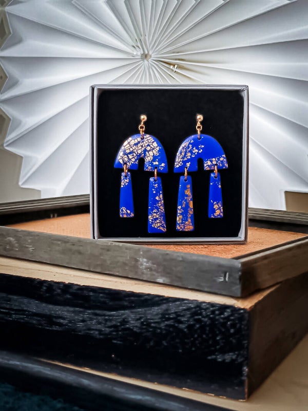 Double pendulum statement earrings in royal blue