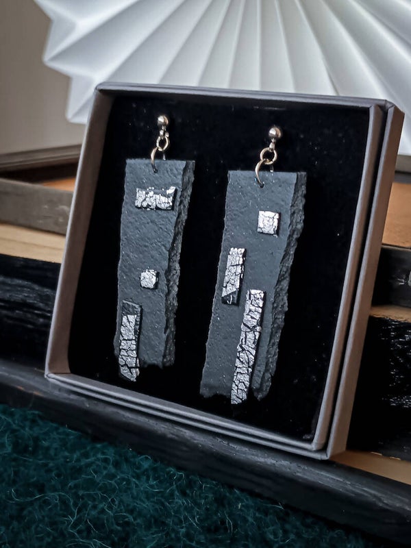 Faux leather artisan statement earrings in black and silver