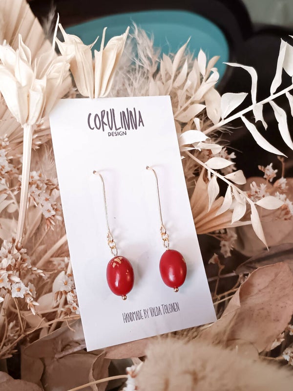 Small oval beaded burgundy earrings