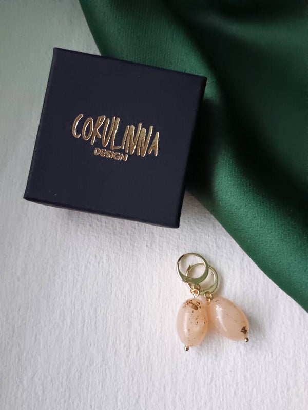 Small oval bead earrings in translucent