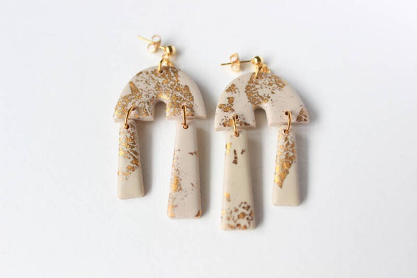 Double pendulum statement earrings in beige