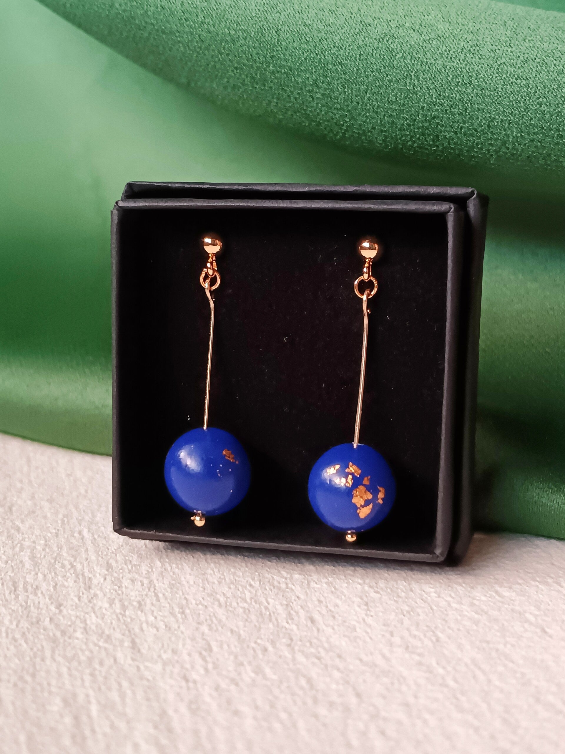 Long small bead earrings in blue