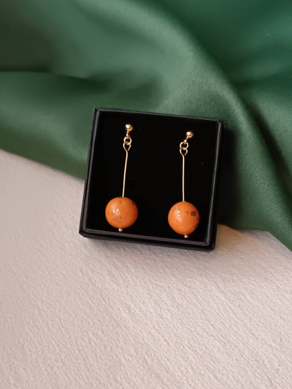 Long small bead earrings in orange