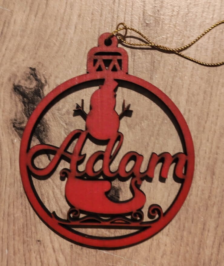 Boule de Noel "bonhomme de neige + traîneau "