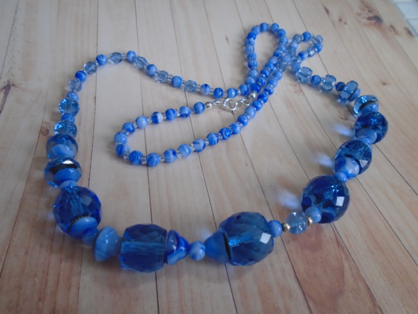 This Exquisite Blue Mixed Colour & Shape Glass Beaded Necklace.