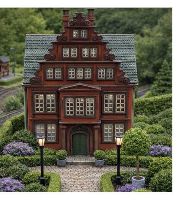 BBU 2612 Set van 2 buxusbollen op stam in betonlook bloembakken