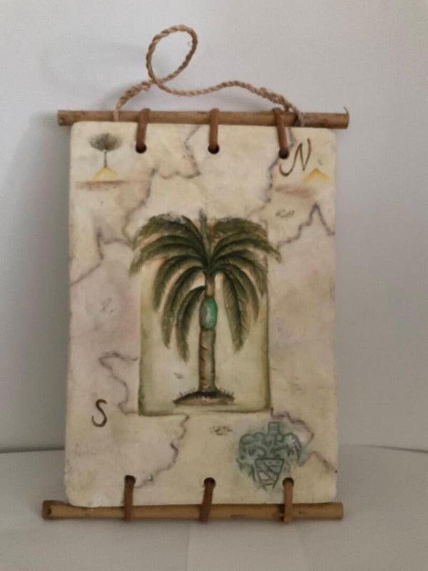 Palm tree on plaster with bamboo