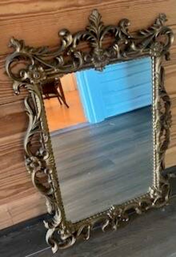 Ornate framed mirror