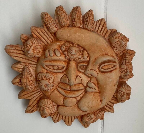Sun and moon plaque