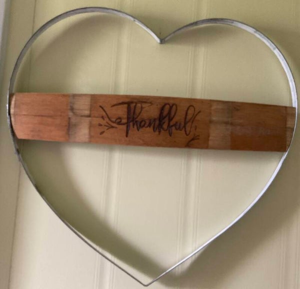 Iron heart with wood banner