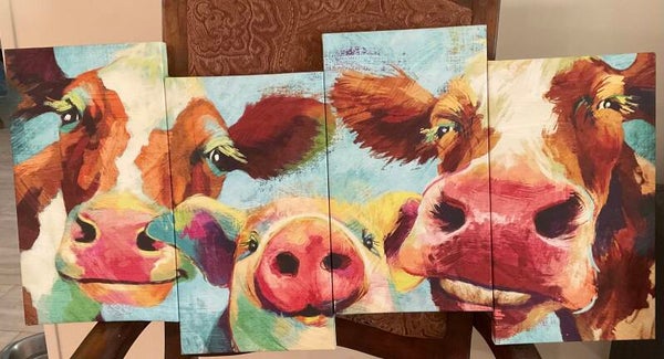 Colorful cows on canvas