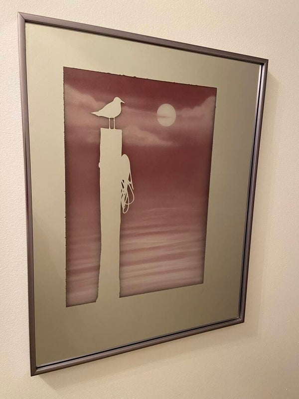 Seagull on pink seaside mirror