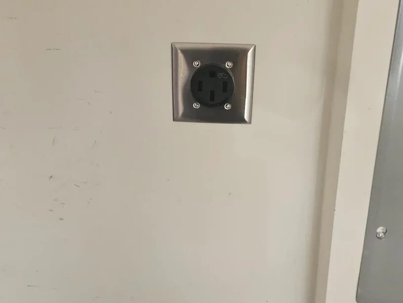 50 amp EV charger outlet installed in a Loganville GA garage