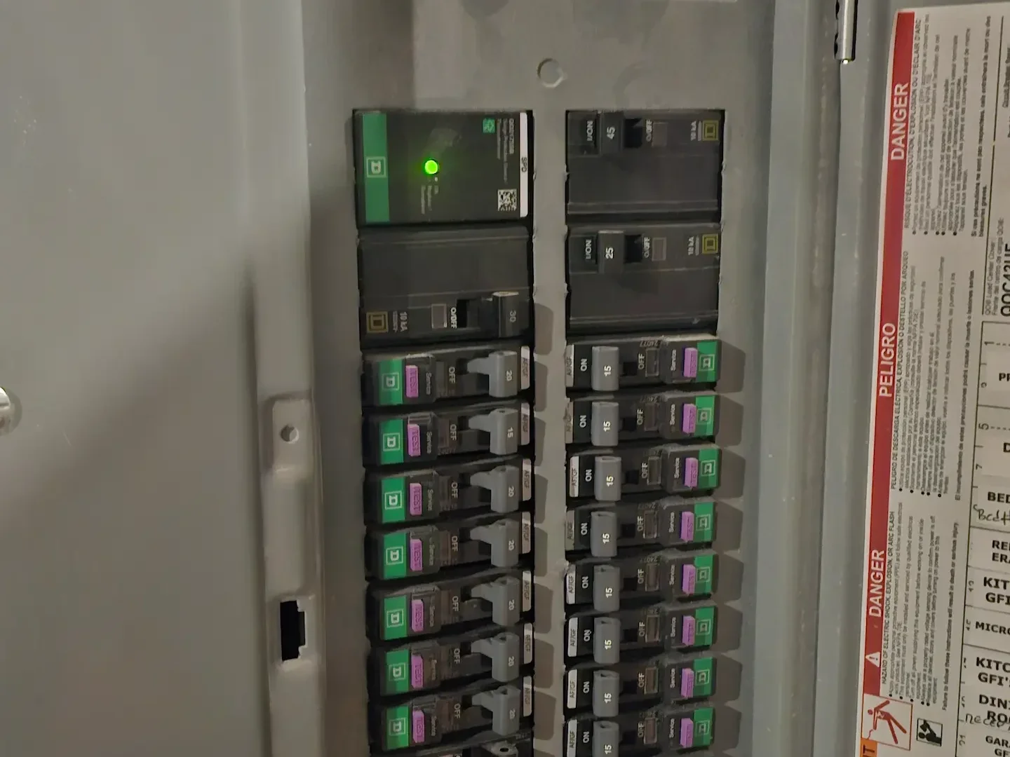 Whole-home surge protector installed in main breaker panel in Loganville GA