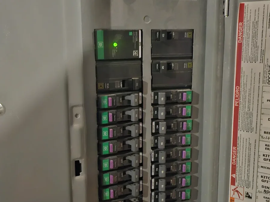 Whole-home surge protector installed in main breaker panel by Kais Pro Repairs in Loganville GA