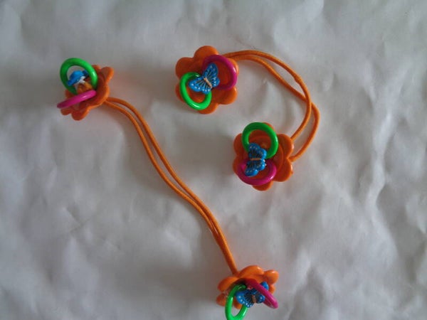 Haar Elastiekje met Bloem Oranje Per 2 Stuks