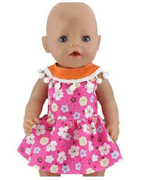 Babypoppen Roze Kleed met pomponnetjes
