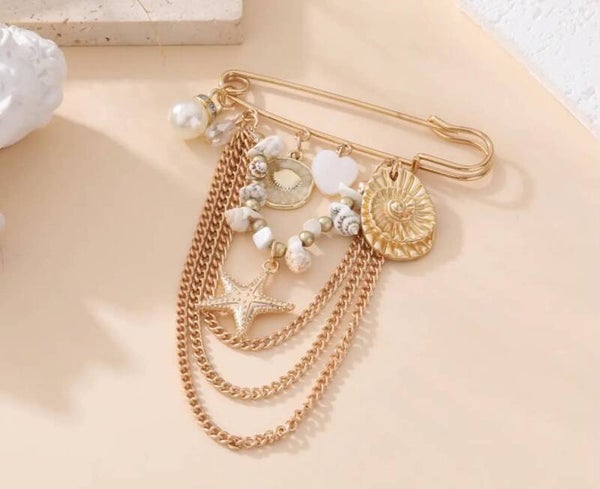 Broche Gold coquillage