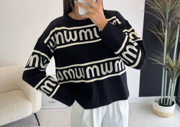 Pull M avec strass