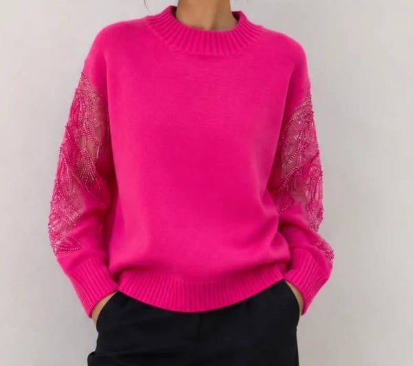 Pull fushia détails manches