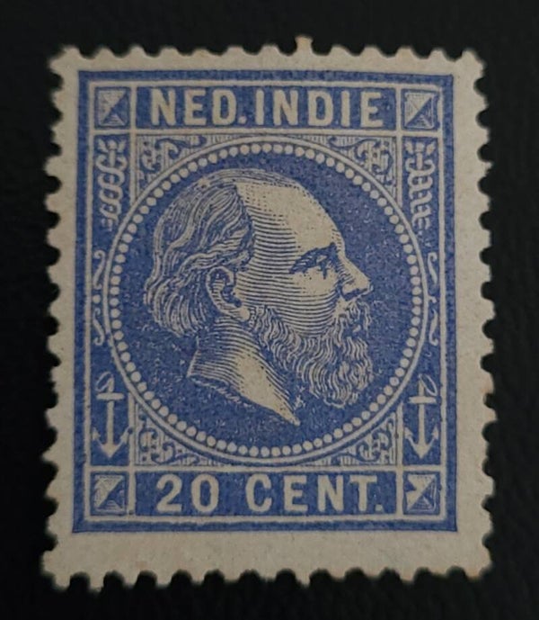 NED. INDIE NVPH 12 ONGESTEMPELD