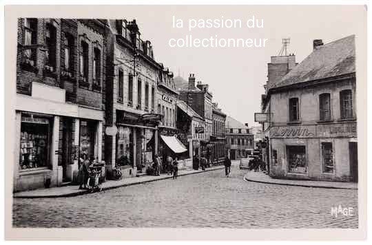 Carte postale de Caudry rue du centre