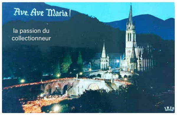Lourdes la basilique illuminée et la procession aux flambeaux