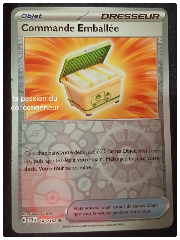 Carte pokémon de la Commande Emballée 143/162