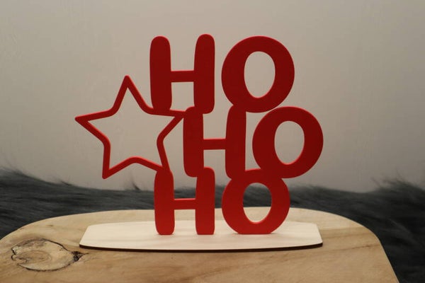 Hohoho kerstdecoratie met houten voet en gekleurde, 3D-geprinte tekst