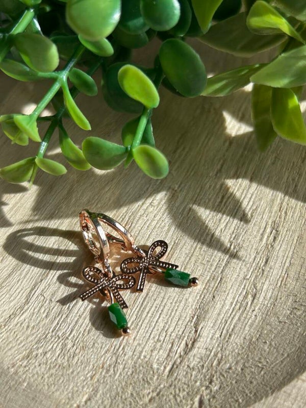 Pink bow & green stone