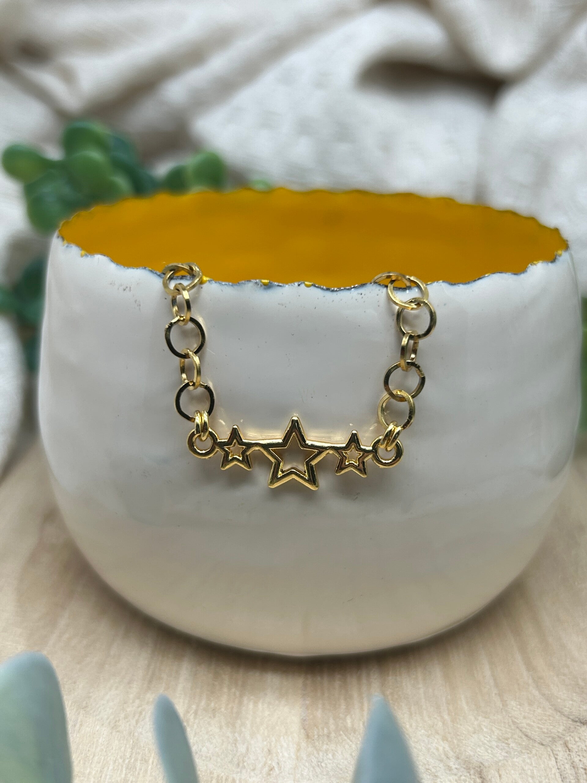 Stertrio goud