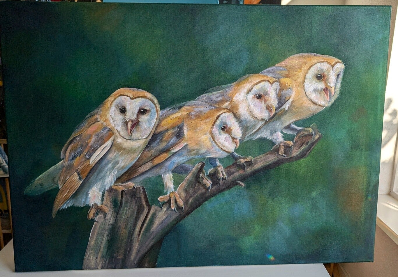 Samenkomst - kerkuilen op een tak