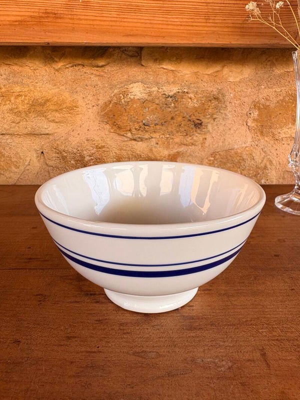 Bol vintage en faïence blanche à liserés bleus