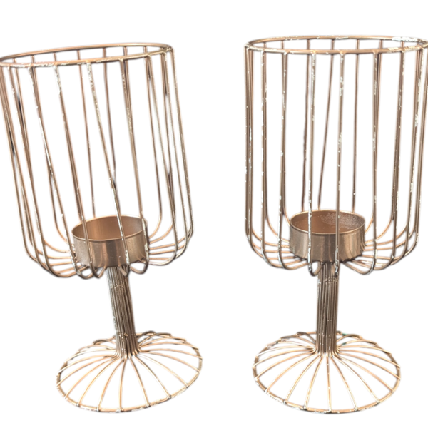 Set goudkleurige waxinelichthouders