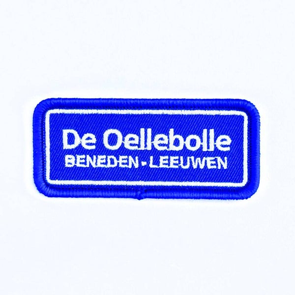 Embleem: De Oellebolle – Beneden-Leeuwen 7 x 3 cm