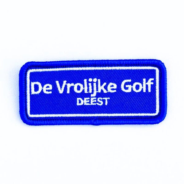 Embleem: De Vrolijke Golf – Deest 7 x 3 cm